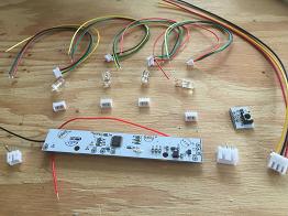 glove board desoldered and components ready to solder